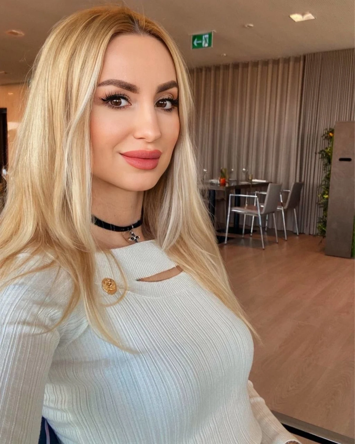 Young adult woman in a fitted crop top photographed in Moscow